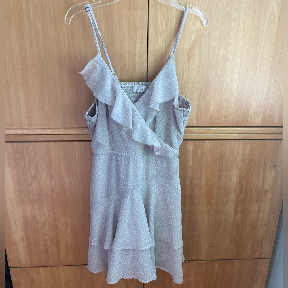 Cream animal print romper